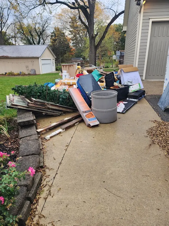 Dumpster being loaded with debris for Residential Dumpster Rental in Socastee